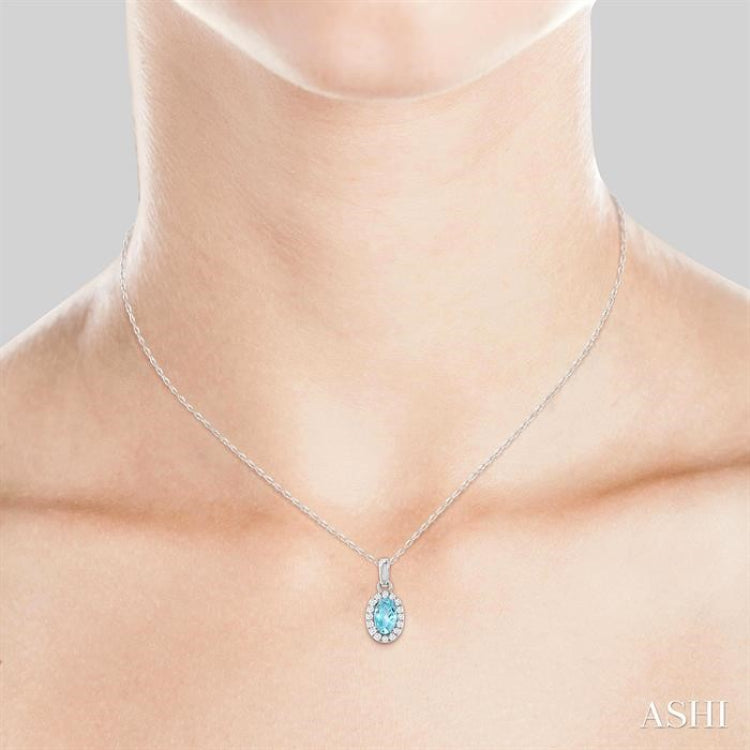 5x3 MM Oval Shape Aquamarine and 1/20 Ctw Single Cut Diamond Halo Semi-Precious Pendant with Chain in 10K White Gold