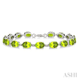 7X5 MM Oval Shape Peridot and 1/10 Ctw Round Cut Diamond Semi-Precious Bracelet in Sterling Silver
