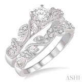 3/8 ctw Diamond Wedding Set With 1/3 ctw Round Center Diamond Leaf Motif Engagement Ring and 1/10 ctw Leaf Motif Wedding Band in 14K White Gold