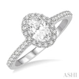 1 1/10 Ctw Oval Halo Round Cut Diamond Engagement Ring With 3/4 Ct Oval Cut Center Stone in 14K White Gold