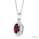 5x3 MM Oval Shape Garnet and 1/20 Ctw Round Cut Diamond Halo Semi-Precious Pendant with Chain in 10K White Gold
