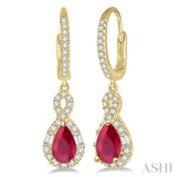 6x4 MM Pear Cut Ruby and 1/2 Ctw Round Cut Diamond Precious Earrings in 14K Yellow Gold