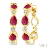 4X3 MM Pear Shape Ruby and 1/20 Ctw Bezel Set Round Cut Diamond Fashion Hoop Earrings in 10K Yellow Gold