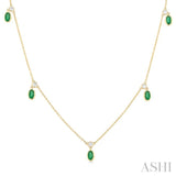 5x3 MM Oval Shape Emerald and 1/4 Ctw Round Cut Diamonds Precious Station Necklace in 14K Yellow Gold