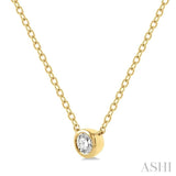 1/10 Ctw Bezel Round Cut Diamond Petite Fashion Pendant With Chain in 10K Yellow Gold