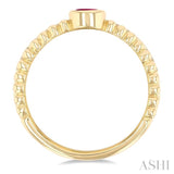 4x3 MM Oval Shape Ruby and 1/5 Ctw Round Cut Diamonds Precious Fashion Split Twin Ring in 10K Yellow Gold