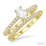 3/4 Ctw Diamond Wedding Set With 5/8 ct Oval Shape Diamond Engagement Ring and 1/6 ct Wedding Band in 14K Yellow Gold